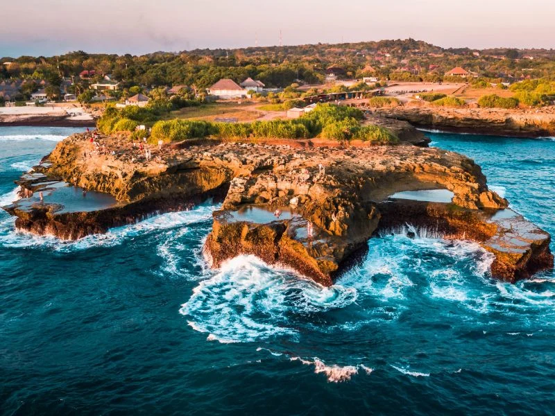 A stunning view of the natural rock formations at Devil's Tears. — Stay Well Package: Nusa Lembongan Adventure